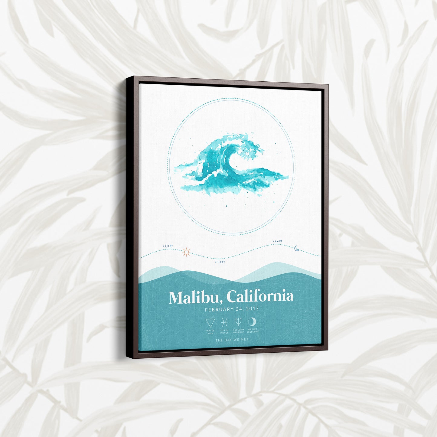 Dark brown framed floating canvas version of the Waves Tide Map poster showing Malibu, California. Waves Tide Map Posters by Salt Atlas are custom posters showing the tide, astrology zodiac sign, and moon phase for a special day, like an anniversary or birthday.