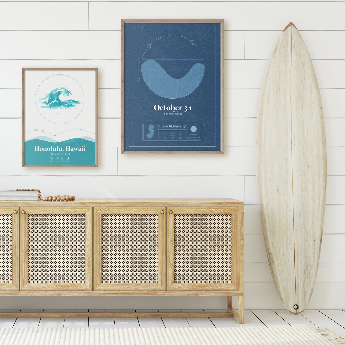 two wood framed pictures of the personalized tide map posters by salt atlas in the Waves option and vintage cobalt blue color of the Nautical Tide Map option in a home setting. These are custom posters showing the tide, weather, and moon phase for a special day, like an anniversary or birthday.